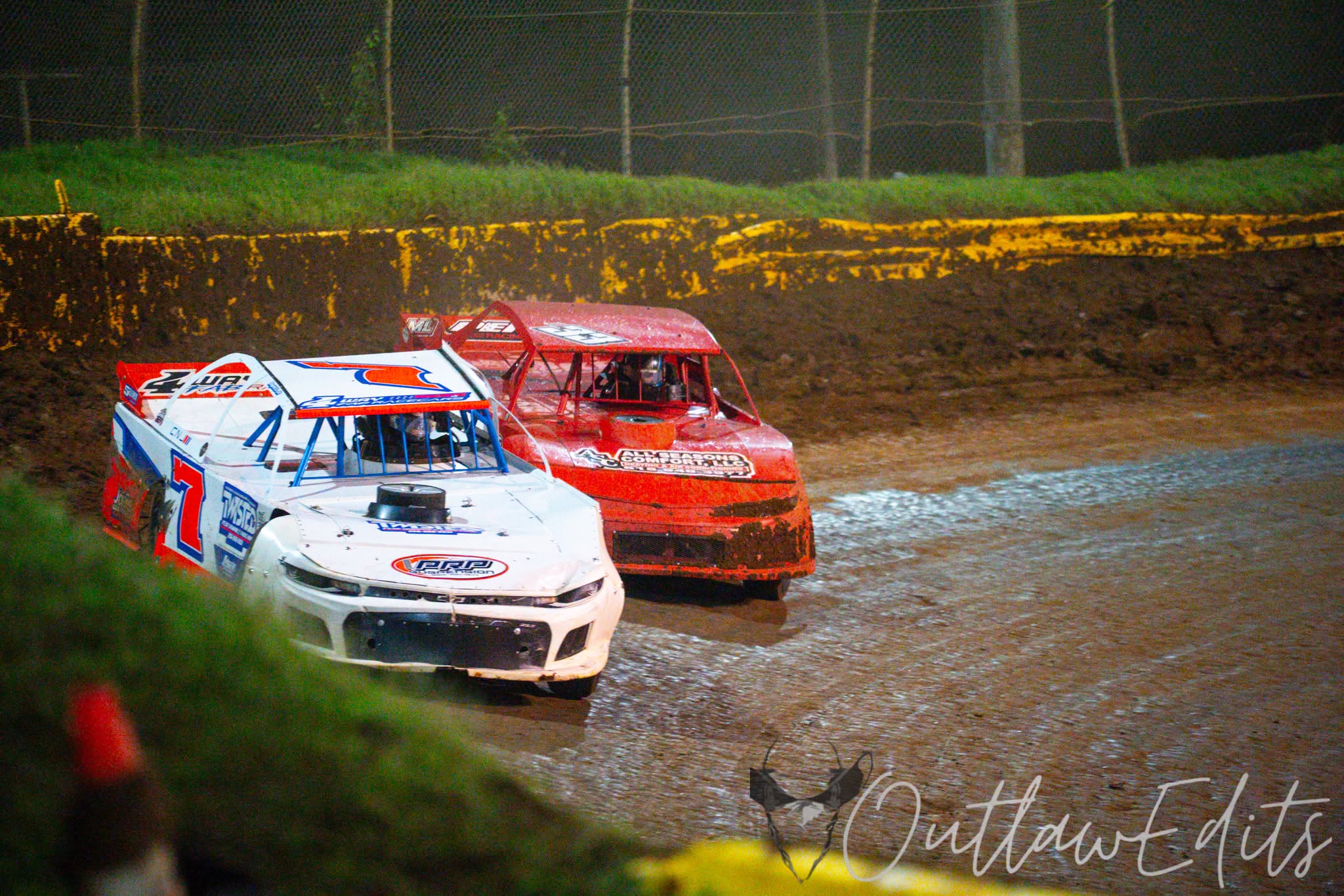 Southern Dirt Series cars racing under the lights